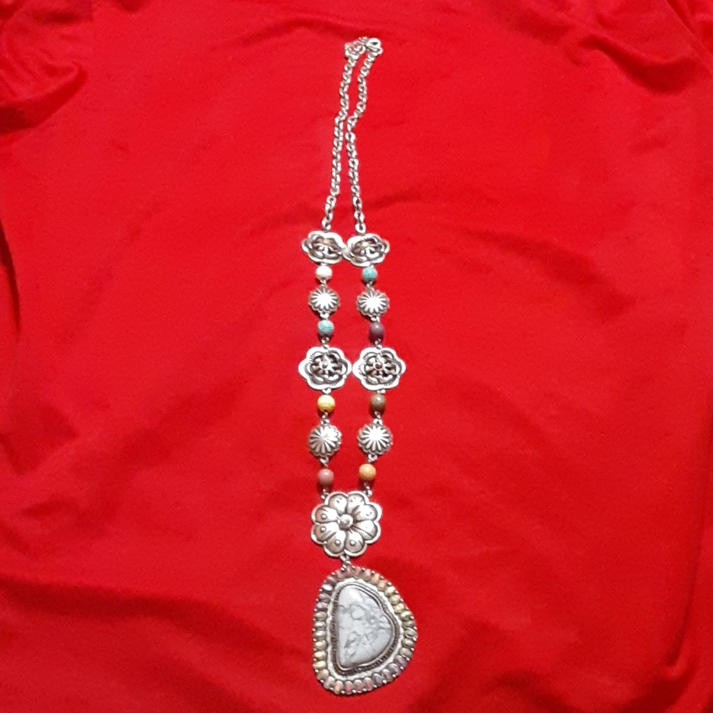 Silver necklace with multi-colored pendant
